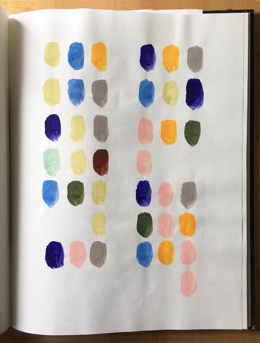 A sketchbook page with six rows of 39 painted oval dots in various colors.