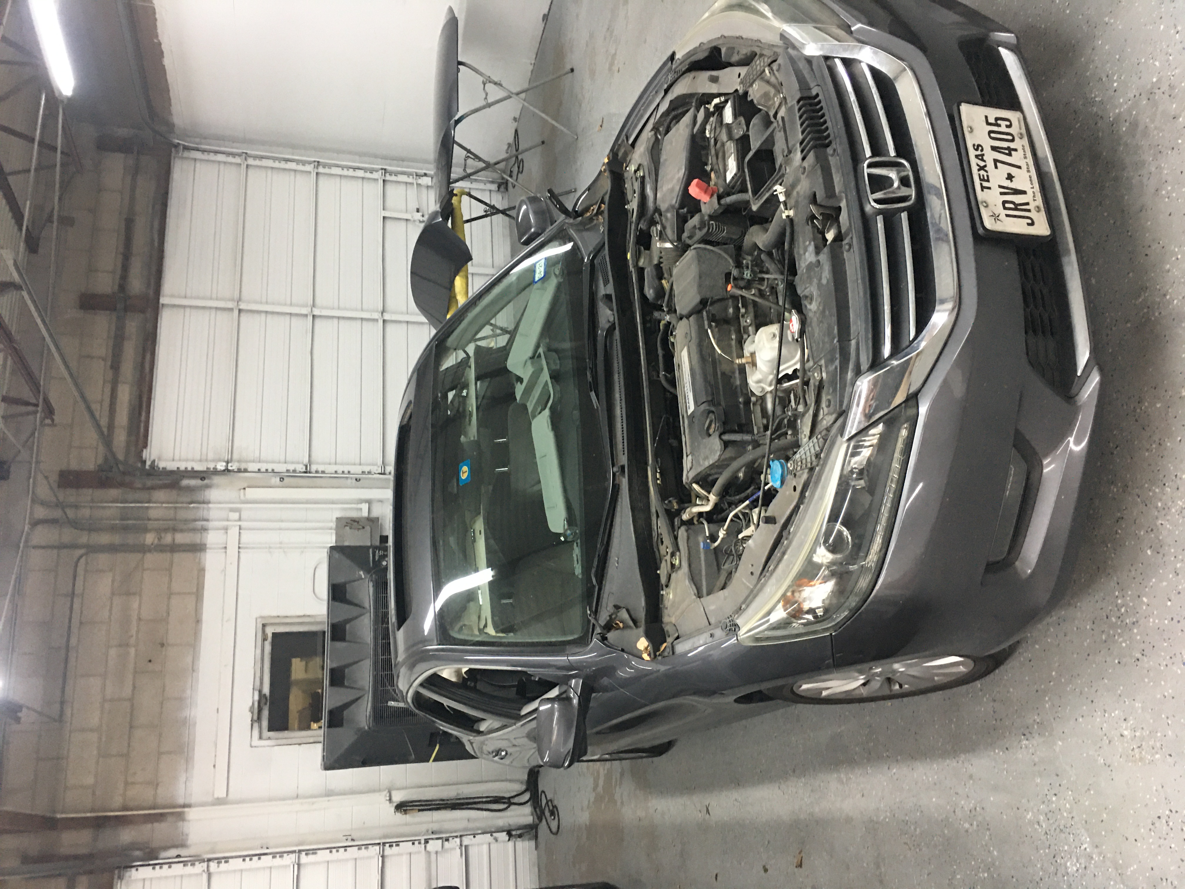 Gray Sedan for Repair