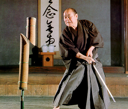 Sensei cutting makiwara at the Noma Dojo, also known as the Kodansha Dojo. This dojo is run by the Kodansha book publishing company and only the top martial artists give lessons or demonstrations. 
This photo is from Sensei's book, "Nihon-to Tameshigiri no Shinzui" The Essence of Japanese Sword Testcutting (Tokyo: Kodansha, 1980). (Photo courtesy Nakamura Taizaburo)