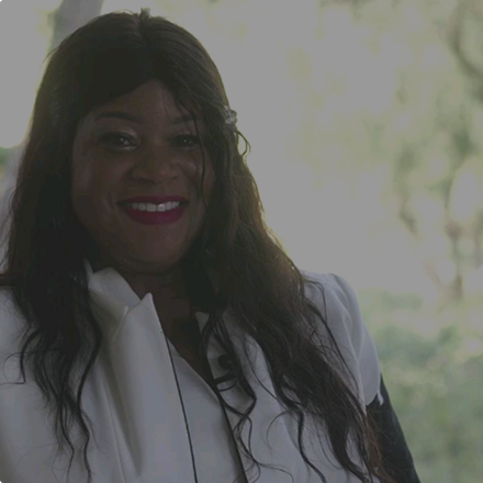 A close up of Pastor Teka smiling