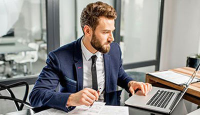 Accountant Man Working On Laptop