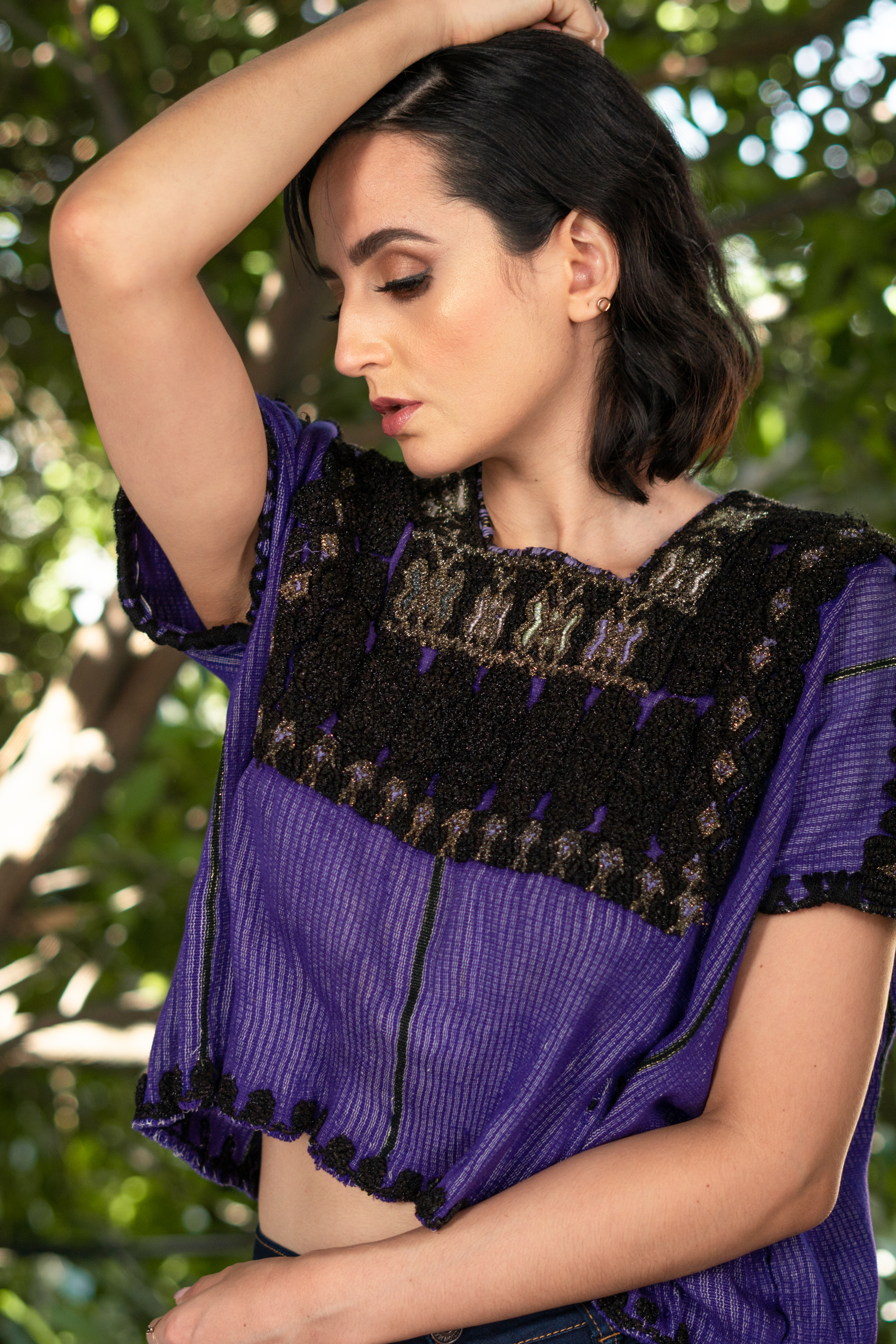 Young girl with shorts and a  vest on the beach