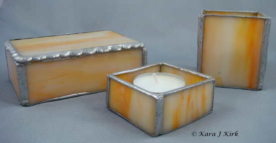 https://0201.nccdn.net/4_2/000/000/071/260/06-24-13-Orange-Stained-Glass-Box-Candle-Set-4x6-554x288.jpg