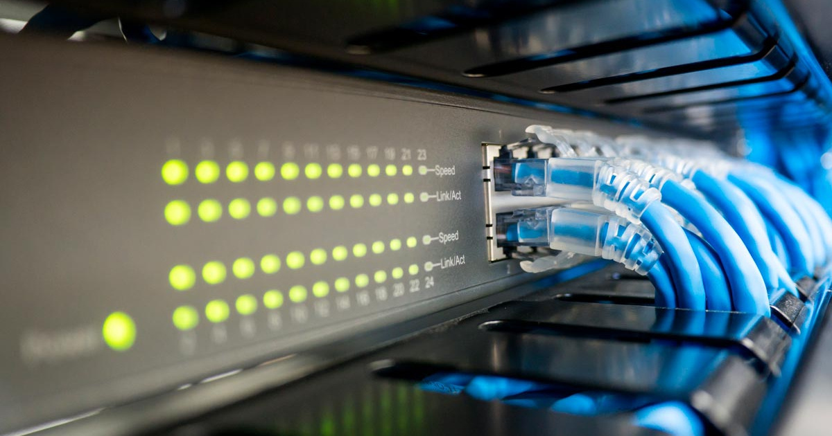 Automotive technician performing an oil check