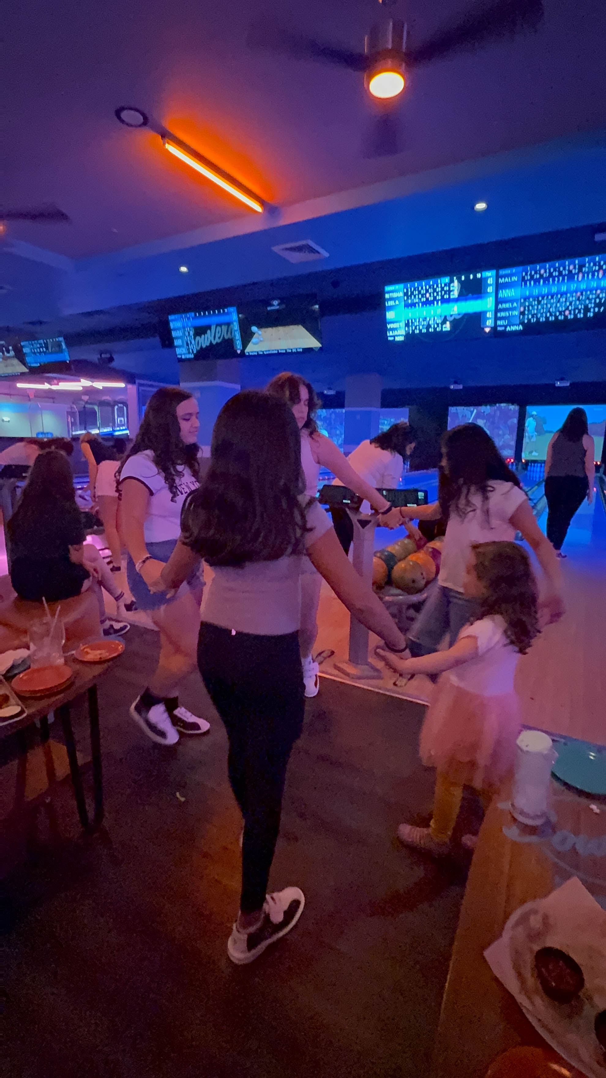Malina commanded us to dance in the bowling alley