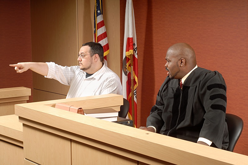 Man giving testimony in court