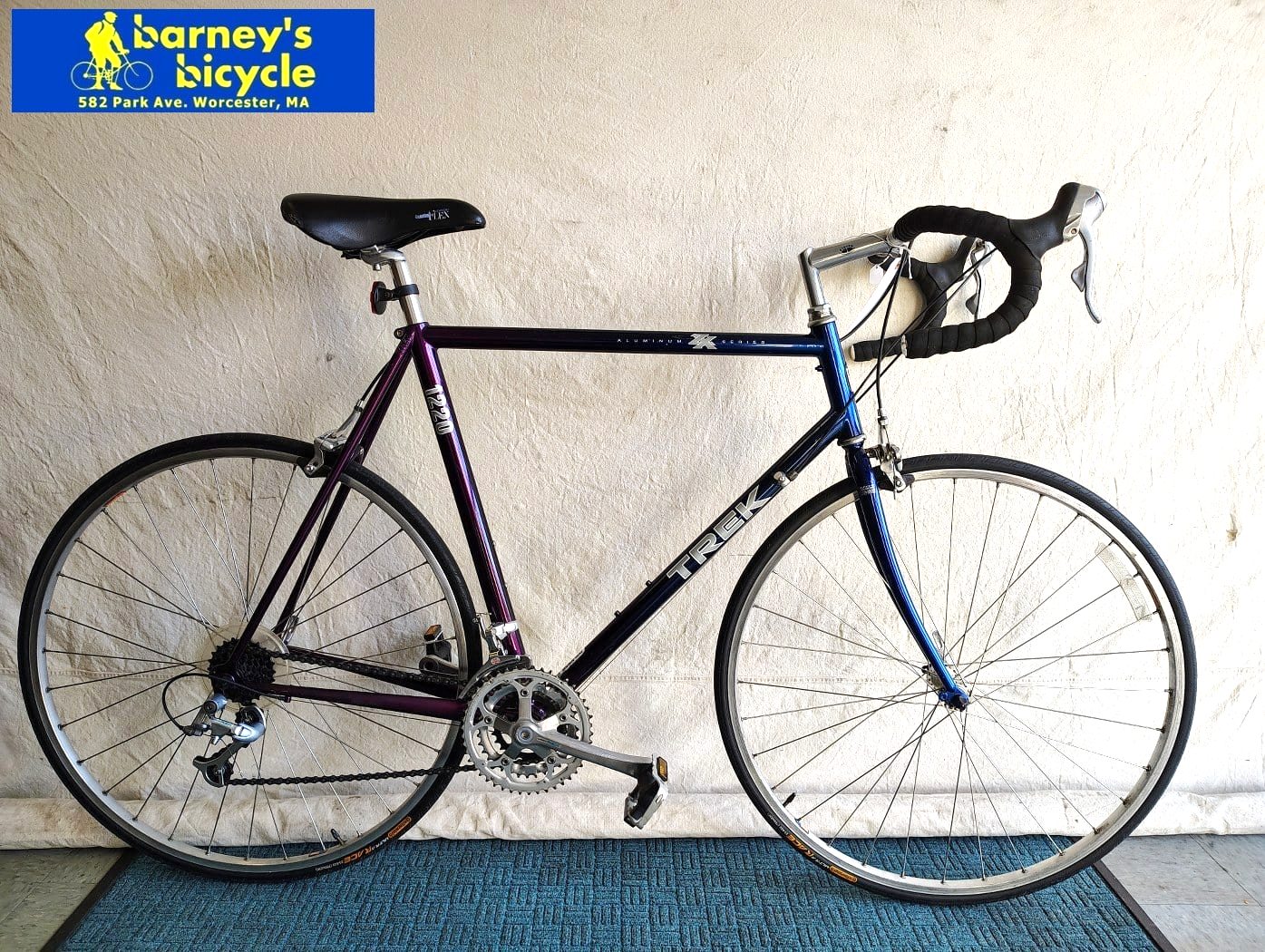 Trek 1220
Frame Size: 58cm LG Aluminum
Rider Height: 5'10-6'1
Drivetrain: Shimano RSX 3x7
Price: $619.00 (Professionally Tuned)
