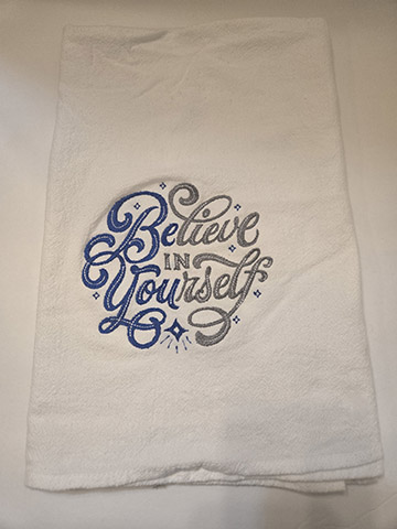 Flower sack towel featuring a believe in yourself design