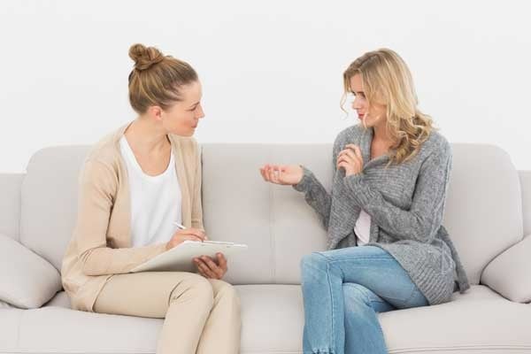 Blonde Woman Talking to Her Therapist 