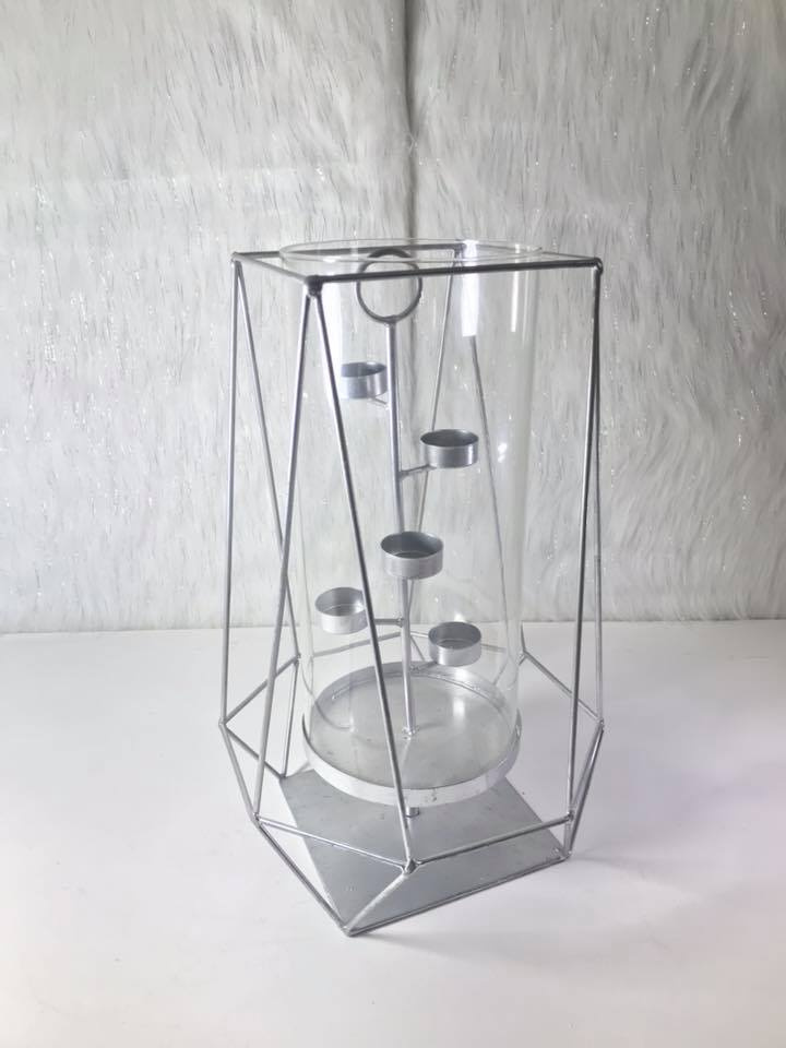 Candelabro Octogonal
 con velas led 
Medidas 50cm Altura x 39cm Ancho  
$ 50.000