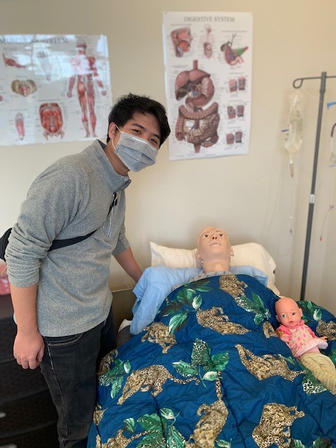 Nurse Aide Student Yang with Mr. Brahms