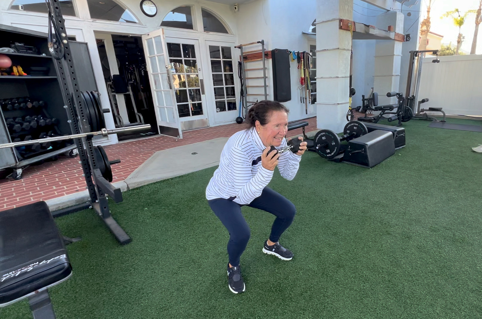 woman doing pull up exercise