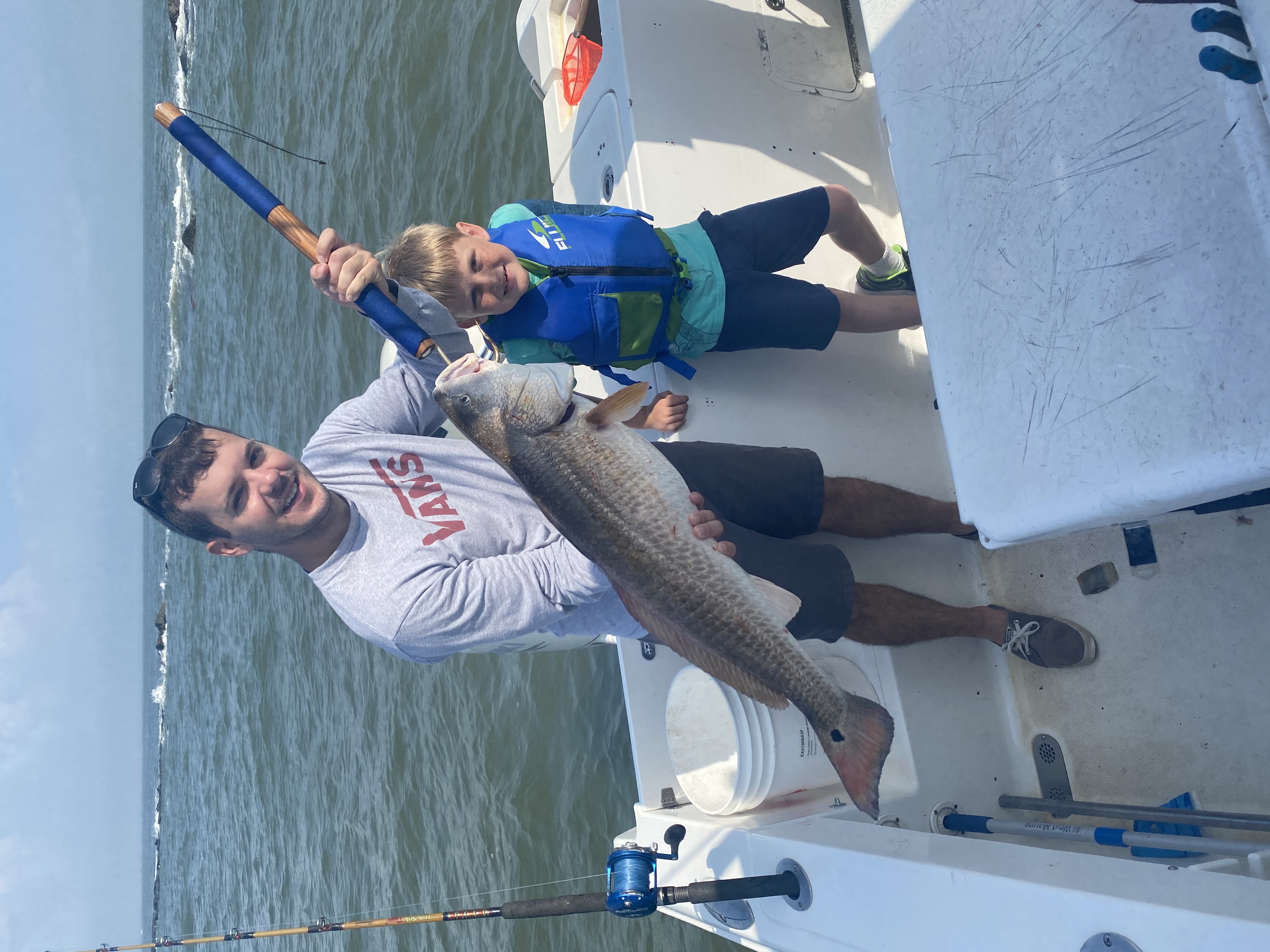 https://0201.nccdn.net/4_2/000/000/078/264/redfish-with-dad-and-son.jpg