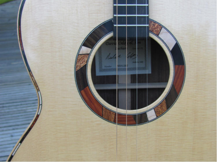 "crazy paving" style soundhole decoration and purfling