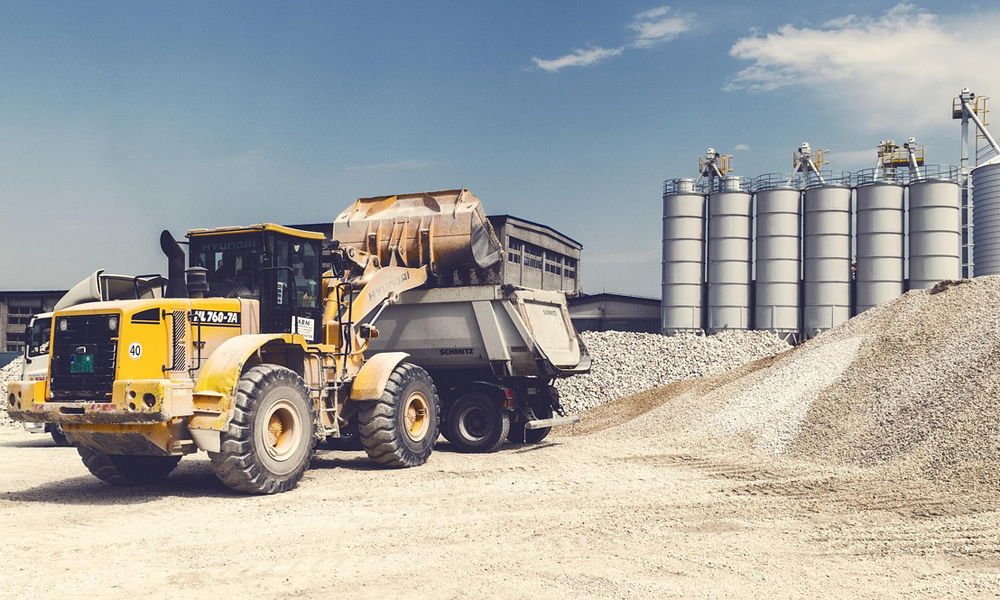 A tractor hauling away materials A tractor hauling away materials