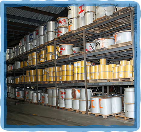 Many spools of rope sitting on shelves Many spools of rope sitting on shelves