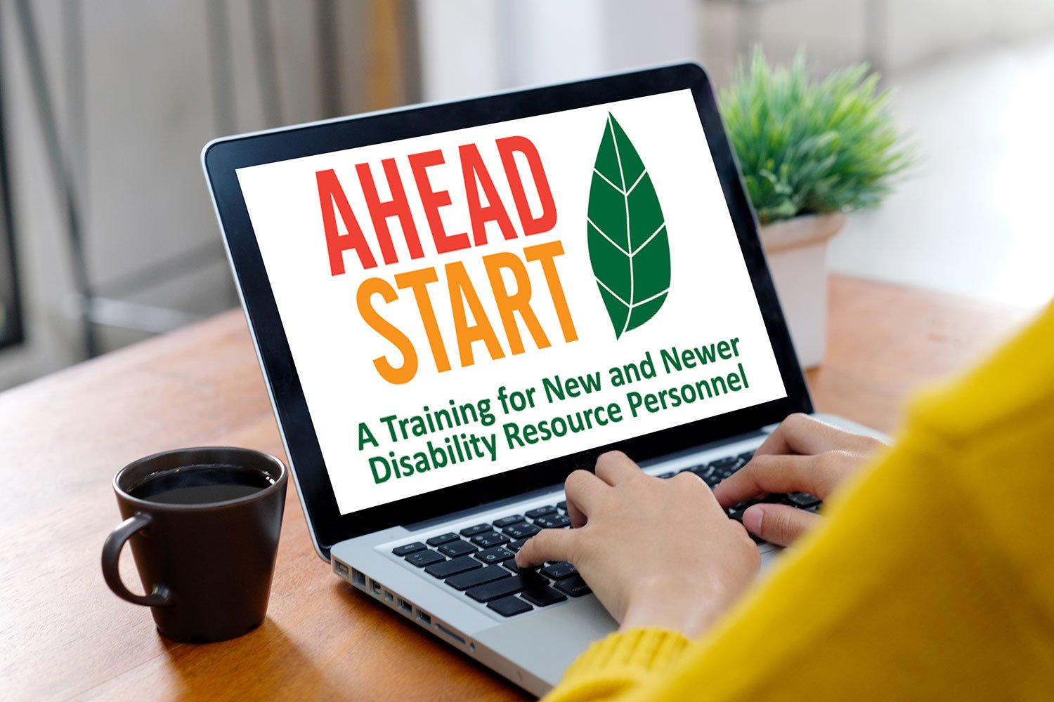 Laptop screen with the AHEAD Start conference logo