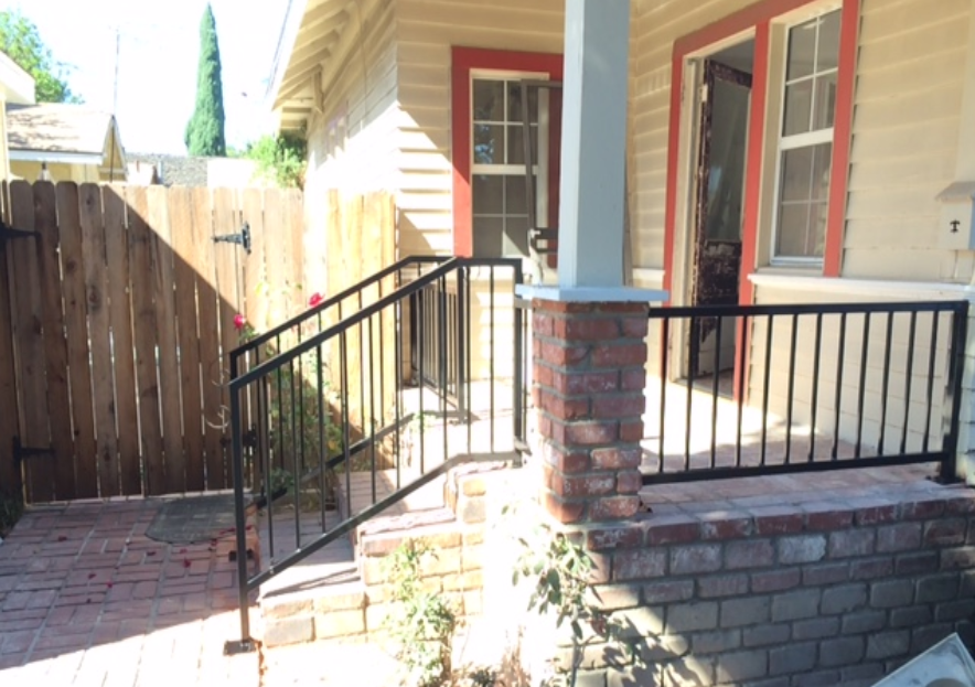 Wrought iron bannisters and porch fencing.
