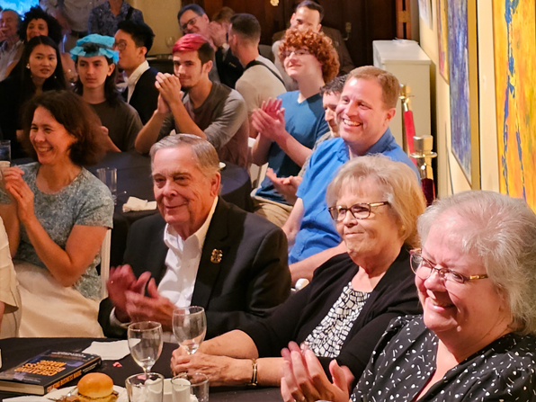 Smiling faces and lots of applause for Chuck from the audience.