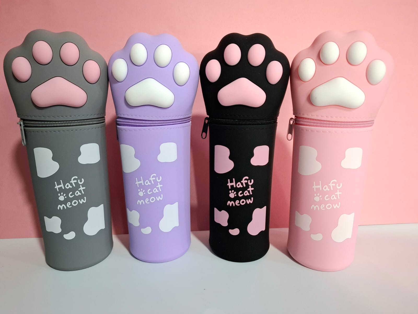 https://0201.nccdn.net/4_2/000/000/081/4ce/cartuchera-patita-de-gato-silicona.jpg