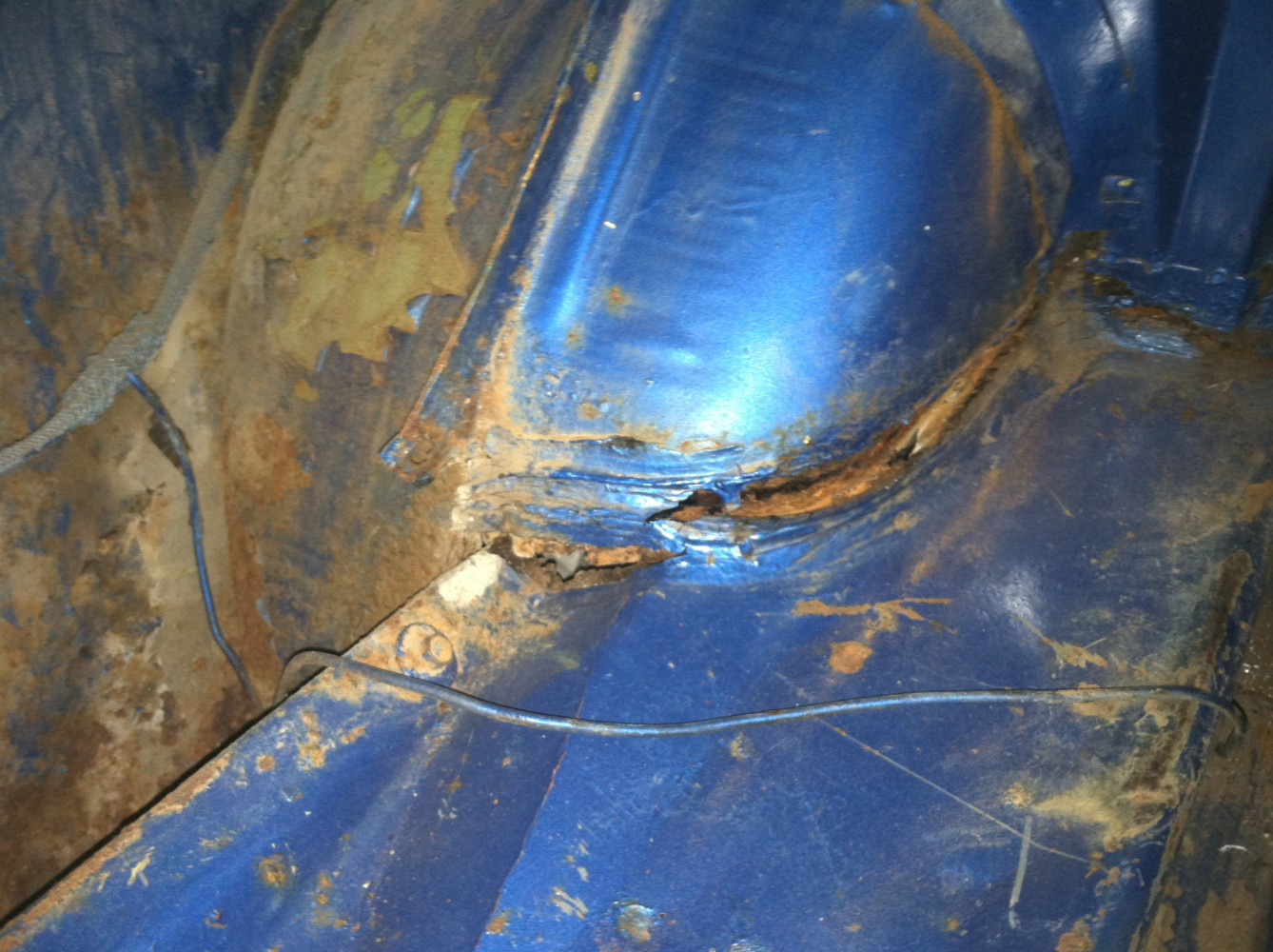 Trunk floor separating from the inner wheel house.