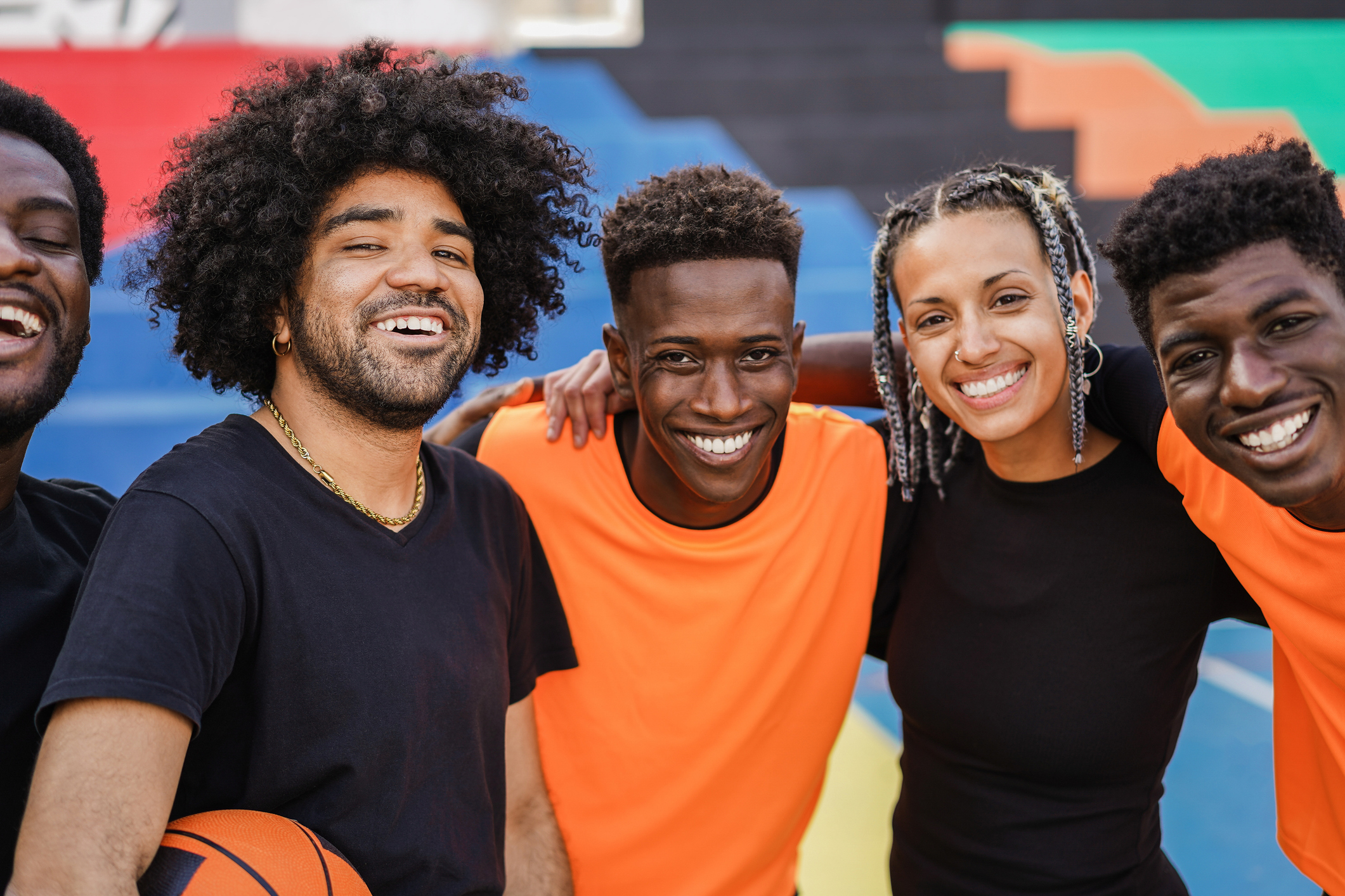 Friends playing basketball 