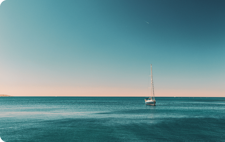 Boat sailing on calm waters.