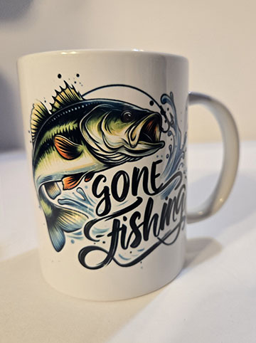 15oz ceramic mug featuring a gone fishing design