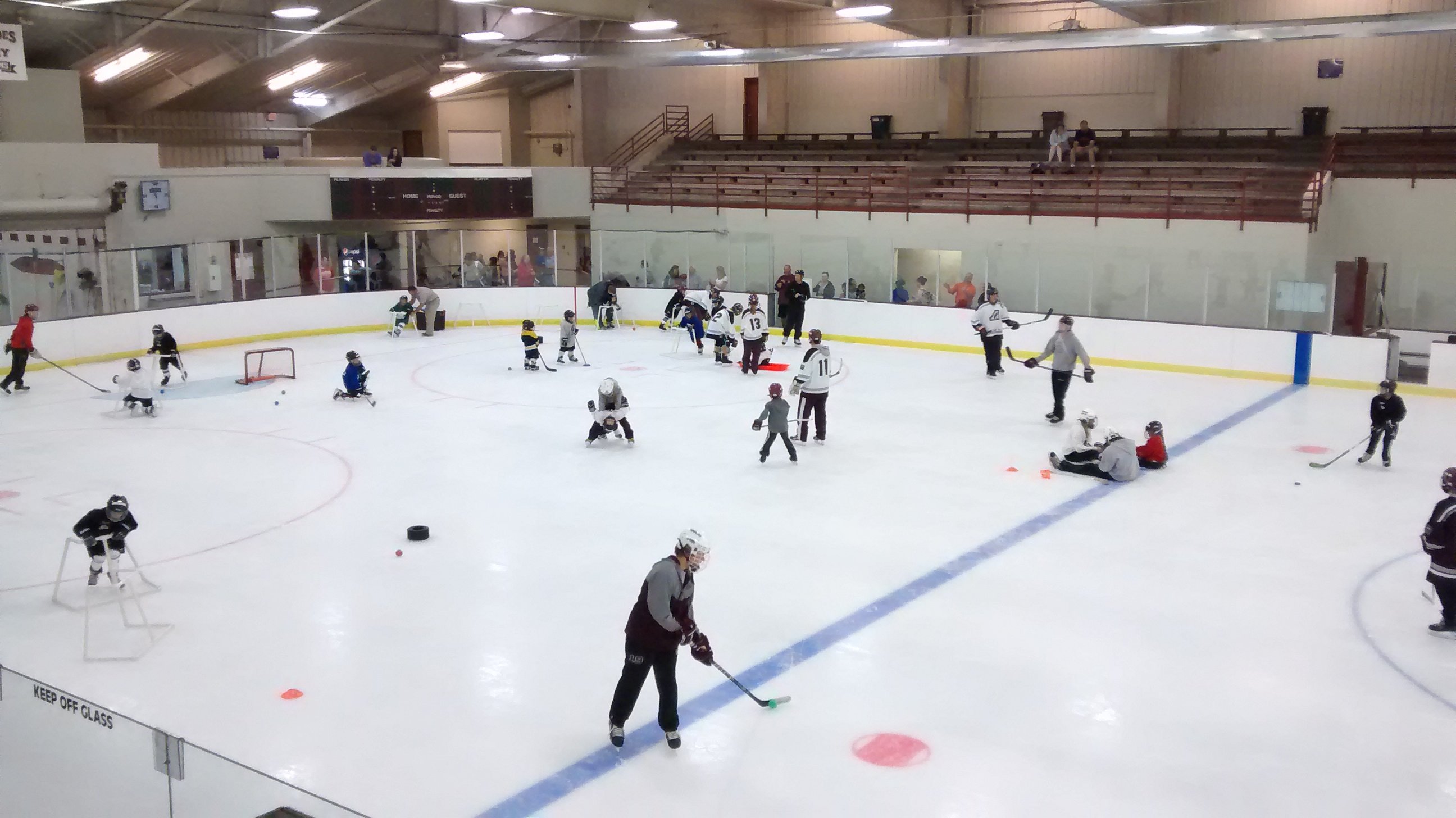 Anoka Ice arena full of players of varying ages


